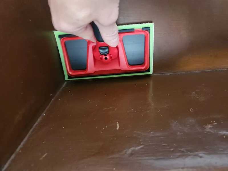 Painting a stair riser with the pad edger